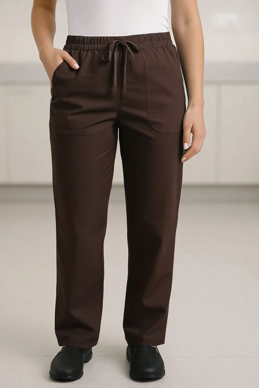 Brown pants worn by a person on a neutral background