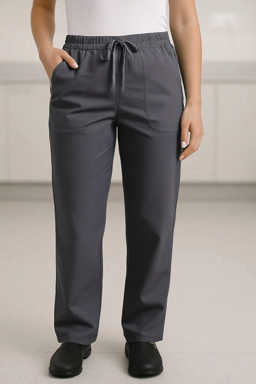 Person wearing gray pants with a white background