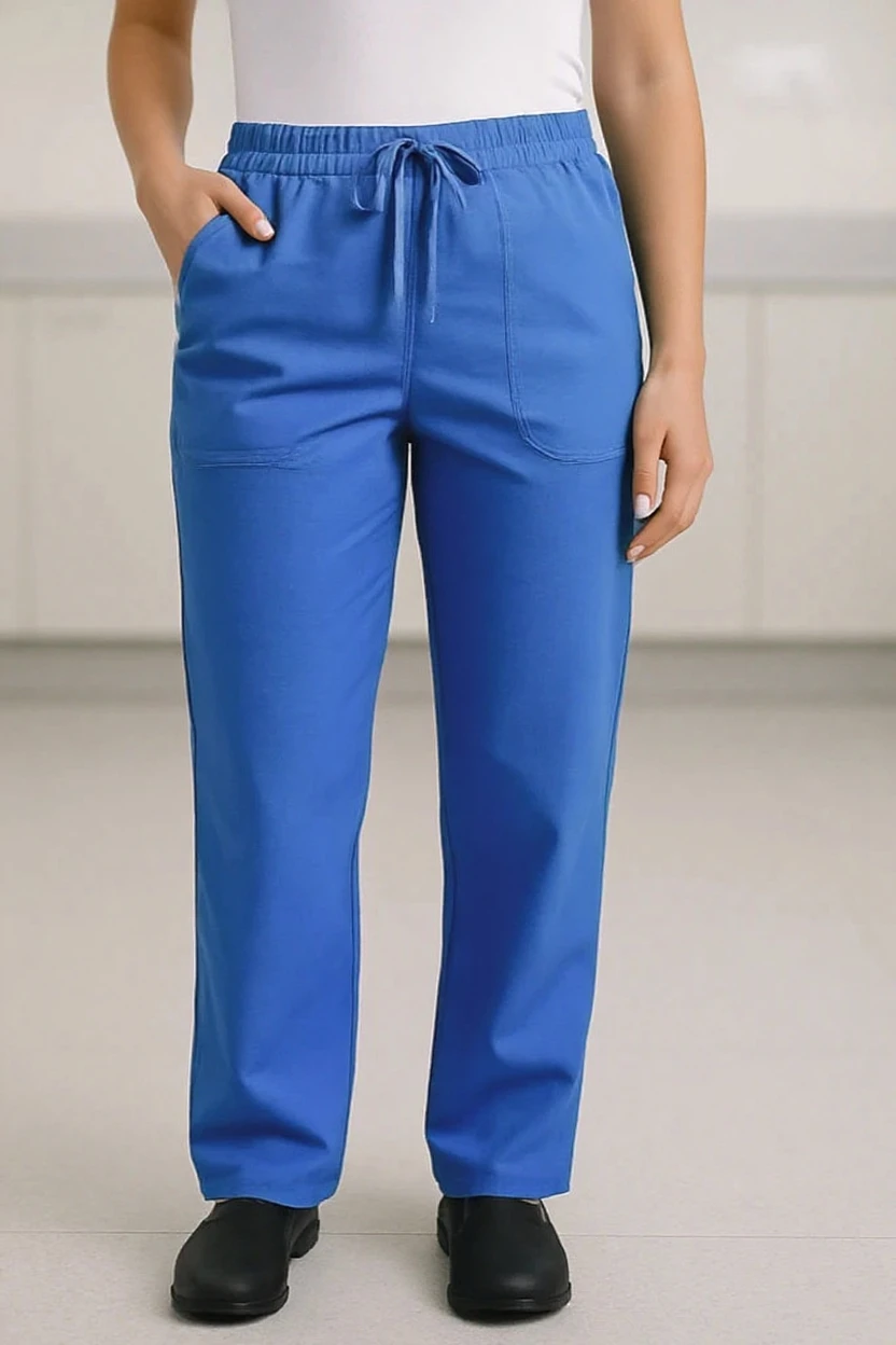 Person wearing blue pants with a neutral background