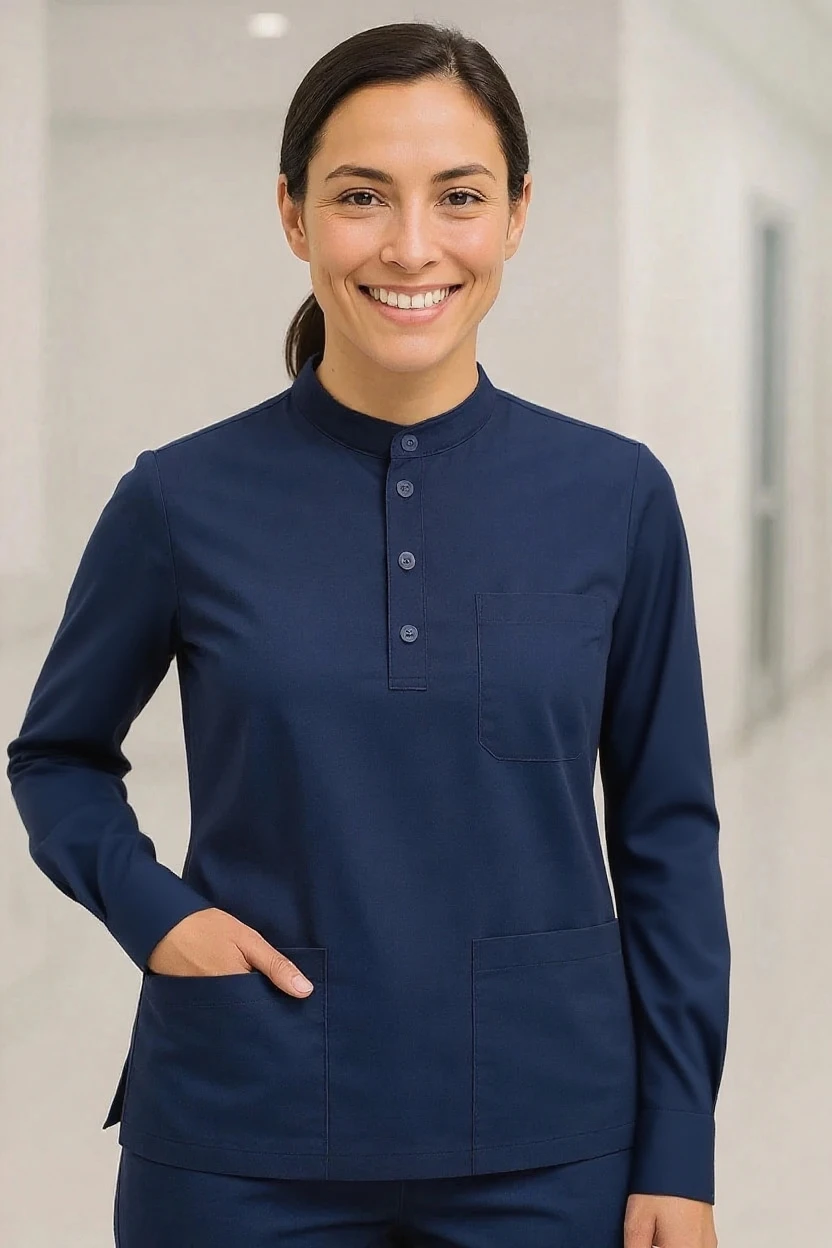 Person wearing a navy blue long-sleeve shirt with a collar in an indoor setting.