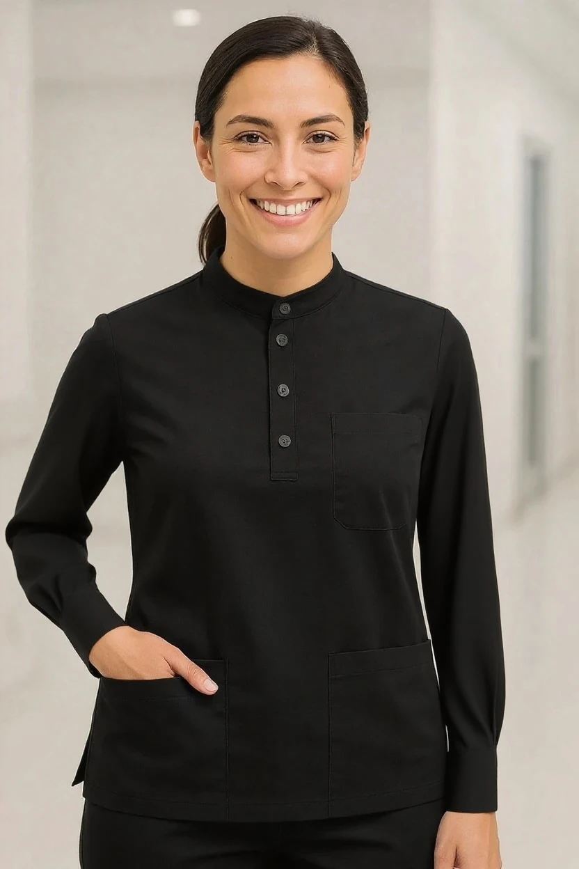 Person wearing a black long-sleeve shirt with a collar in an indoor setting